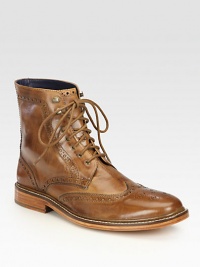 Stay one step ahead of the rest in this finely crafted lace-up ankle boot of perforated leather.Leather upperLeather liningPadded insoleLeather soleImported Stay one step ahead of the rest in this finely crafted lace-up ankle boot of perforated leather.Leather upperLeather liningPadded insoleLeather soleImported