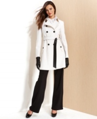 DKNY's wool-blend trench coat keeps you warm - and stylish - all season. This chic topper is subtle yet totally striking. DKNY's wool-blend trench coat keeps you warm - and stylish - all season. This chic topper is subtle yet totally striking.