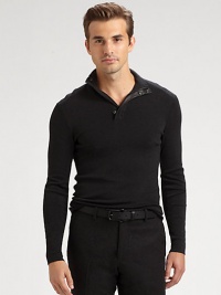 Crafted from luxurious Italian merino wool, this trim-fitting sweater zips down to reveal a sumptuous matte leather lining at the snapped mockneck collar.MockneckZip placketMerino woolDry cleanImported Crafted from luxurious Italian merino wool, this trim-fitting sweater zips down to reveal a sumptuous matte leather lining at the snapped mockneck collar.MockneckZip placketMerino woolDry cleanImported