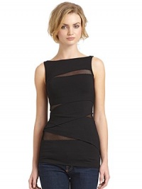 THE LOOKBoatneckSleeveless Asymmetrical tiered detailsMesh accentsTHE FITAbout 28 from shoulder to hemTHE MATERIALRayon/spandexCARE & ORIGINDry cleanMade in USAModel shown is 5'10 (177cm) wearing US size Small. THE LOOKBoatneckSleeveless Asymmetrical tiered detailsMesh accentsTHE FITAbout 28 from shoulder to hemTHE MATERIALRayon/spandexCARE & ORIGINDry cleanMade in USAModel shown is 5'10 (177cm) wearing US size Small.