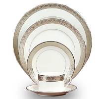 The finest Limoges porcelain and ornate scrollwork in a single polished platinum band add glittering distinction to any elegant table.