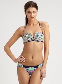A bold, eclectic print and classic bikini silhouette combine to create an alluring design, including a removable halter strap for style versatility. Removable halter strapBandeau topBack clasp closureSexy, ruched sides on stretch bottomFully lined80% nylon/20% spandexHand washMade in USA A bold, eclectic print and classic bikini silhouette combine to create an alluring design, including a removable halter strap for style versatility. Removable halter strapBandeau topBack clasp closureSexy, ruched sides on stretch bottomFully lined80% nylon/20% spandexHand washMade in USA