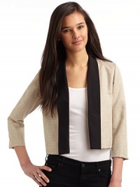 THE LOOKTuxedo-inspired cropped styleContrast satin lapelLong sleevesTHE FITAbout 18½ from shoulder to hemTHE MATERIAL70% viscose/19% polyester/11% nylonCARE & ORIGINDry cleanMade in USAModel shown is 5'10 (177cm) wearing US size Small. THE LOOKTuxedo-inspired cropped styleContrast satin lapelLong sleevesTHE FITAbout 18½ from shoulder to hemTHE MATERIAL70% viscose/19% polyester/11% nylonCARE & ORIGINDry cleanMade in USAModel shown is 5'10 (177cm) wearing US size Small.