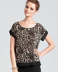 A lightweight Aqua tee is updated with leopard print for a fierce look with playful spirit. A lightweight Aqua tee is updated with leopard print for a fierce look with playful spirit.