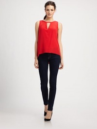 Vibrant silk finished with a front cutout and strappy open back for an alluring touch of skin-baring chic.JewelneckSleevelessFront cutoutBack top-button closureAbout 24 from shoulder to hemSilkDry cleanImportedModel shown is 5'9½ (176cm) wearing US size Small. Vibrant silk finished with a front cutout and strappy open back for an alluring touch of skin-baring chic.JewelneckSleevelessFront cutoutBack top-button closureAbout 24 from shoulder to hemSilkDry cleanImportedModel shown is 5'9½ (176cm) wearing US size Small.