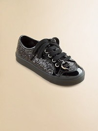 Sparkle and shine in a comfy sneaker, covered with sequins and accented with shiny patent.Faux leather and faux patent upper with sequinsLace-up front with heart charmFaux leather liningPadded insoleRubber composite soleImported Sparkle and shine in a comfy sneaker, covered with sequins and accented with shiny patent.Faux leather and faux patent upper with sequinsLace-up front with heart charmFaux leather liningPadded insoleRubber composite soleImported