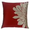 The Gemini red pillow in deep red cotton sateen features half of our signature chrysanthemum blossom on each side. Pair two Gemini pillows next to each other to complete the flower. Down insert included.