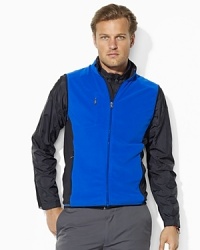 RLX's soft fleece vest takes performance wear to the next level with an extra dose of stretch for easy mobility and sleek style. RLX's soft fleece vest takes performance wear to the next level with an extra dose of stretch for easy mobility and sleek style.