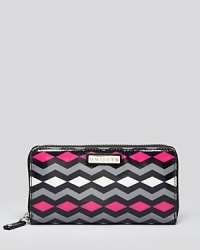 A preppy chevron print punctuates this Milly wallet, putting a Mod, 60's-inspired spin on a modern girl essential. Its lined interior features 12 card pockets and a zip pocket.