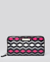 A preppy chevron print punctuates this Milly wallet, putting a Mod, 60's-inspired spin on a modern girl essential. Its lined interior features 12 card pockets and a zip pocket. A preppy chevron print punctuates this Milly wallet, putting a Mod, 60's-inspired spin on a modern girl essential. Its lined interior features 12 card pockets and a zip pocket.
