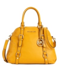 A versatile design ready to take you from the work place to the weekend. This classic bowling satchel by MICHAEL Michael Kors features elegant signature detailing and polished roller buckle detail. A versatile design ready to take you from the work place to the weekend. This classic bowling satchel by MICHAEL Michael Kors features elegant signature detailing and polished roller buckle detail.