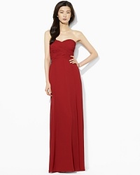Exuding elegant glamour, the beautiful floor-grazing Emmie gown is designed in lustrous silk-blend dupioni with a crossover sweetheart neckline for feminine charm. Exuding elegant glamour, the beautiful floor-grazing Emmie gown is designed in lustrous silk-blend dupioni with a crossover sweetheart neckline for feminine charm.