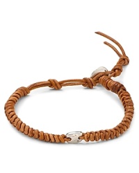 Rugged leather is offset by a flash of sterling silver for an ultra-cool bracelet that supports your masculine edge. Rugged leather is offset by a flash of sterling silver for an ultra-cool bracelet that supports your masculine edge.