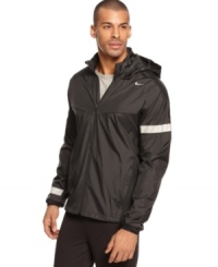 Visibility is key-stay in sight and feeling fine with this Nike jacket featuring reflective details and Dri-Fit technology. Visibility is key-stay in sight and feeling fine with this Nike jacket featuring reflective details and Dri-Fit technology.