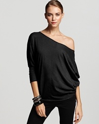 Rock this effortlessly sexy and chic top from Velvet by Graham & Spencer with skinny jeans for sleek juxtaposition.