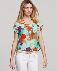 A watercolor-inspired print adds artistic flair to this ALTERNATIVE top. A watercolor-inspired print adds artistic flair to this ALTERNATIVE top.