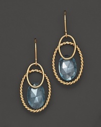 Faceted blue topaz adds rich sparkle to links of 14K yellow gold. By Nancy B. Faceted blue topaz adds rich sparkle to links of 14K yellow gold. By Nancy B.