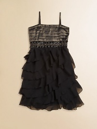 She'll shine like a star in this gorgeous frock with a pleated, metallic bodice and complimentary, cascading ruffled skirt.Straight necklineAdjustable spaghetti strapsPullover stylePleated bodiceJeweled waistbandRuffled skirtPolyesterHand washImported She'll shine like a star in this gorgeous frock with a pleated, metallic bodice and complimentary, cascading ruffled skirt.Straight necklineAdjustable spaghetti strapsPullover stylePleated bodiceJeweled waistbandRuffled skirtPolyesterHand washImported