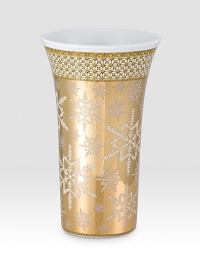 From the house of Versace porcelain collection, this elegant vase is covered with beautifully detailed snowflakes. From the Christmas In Your Heart CollectionPorcelain10¼ highHand washMade in Germany From the house of Versace porcelain collection, this elegant vase is covered with beautifully detailed snowflakes. From the Christmas In Your Heart CollectionPorcelain10¼ highHand washMade in Germany