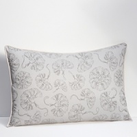 Adorned with printed tassels allover, this patterned sham embodies elegant style and modern sophistication.