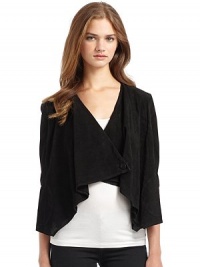 THE LOOKOpen front with single-button closureThree-quarter sleevesLong sleeves with snap cuffsPatch side pocketsUneven hemTHE FITAbout 20 from shoulder to hemTHE MATERIALLeather; cotton liningCARE & ORIGINDry clean by a leather specialistImportedOUR FIT MODEL RECOMMENDS ordering one size up as this style runs small. THE LOOKOpen front with single-button closureThree-quarter sleevesLong sleeves with snap cuffsPatch side pocketsUneven hemTHE FITAbout 20 from shoulder to hemTHE MATERIALLeather; cotton liningCARE & ORIGINDry clean by a leather specialistImportedOUR FIT MODEL RECOMMENDS ordering one size up as this style runs small.