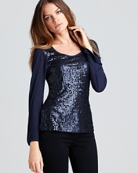 Decadent sequin embellishment turns a staple Shiloh770 tee into a fresh, exciting piece. Team with sleek denim for 24-7 chic. Decadent sequin embellishment turns a staple Shiloh770 tee into a fresh, exciting piece. Team with sleek denim for 24-7 chic.
