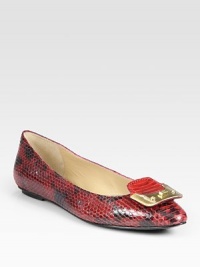 Tried-and-true leather ballet flat in a street-chic snake print with an oversized buckle detail at the toe. Snake-print leather upperLeather lining and solePadded insoleImported