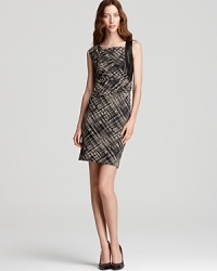Trade your LBD for something unexpected with this Lafayette 148 New York dress. A graphic print emboldens an artfully draped silhouette, punctuated with leather insets for serious fashion presence. Trade your LBD for something unexpected with this Lafayette 148 New York dress. A graphic print emboldens an artfully draped silhouette, punctuated with leather insets for serious fashion presence.
