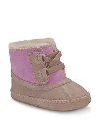 At the crossroads of the boot and bootie, this cute boot gets it right with soft 2-tone sheepskin upper and cozy plush lining. At the crossroads of the boot and bootie, this cute boot gets it right with soft 2-tone sheepskin upper and cozy plush lining.