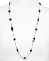 Imaginatively crafted with scattered stones, kate spade new york's long-link necklace is a must-have ticket to bold style. Wear it to enliven crisp summer basics.