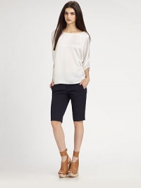 Glistening silk boatneck has three-quarter dolman sleeves and an unanticipated hi-low hem. BoatneckThree-quarter dolman sleevesHi-low hem hits below the hipsSilkDry cleanImportedModel shown is 5'10 (177cm) wearing US size Small. Glistening silk boatneck has three-quarter dolman sleeves and an unanticipated hi-low hem. BoatneckThree-quarter dolman sleevesHi-low hem hits below the hipsSilkDry cleanImportedModel shown is 5'10 (177cm) wearing US size Small.