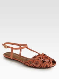 Intricate peek-a-boo cutouts form this t-strap silhouette, with feminine scalloped edges and an adjustable ankle strap. Leather upperAdjustable ankle strapLeather lining and solePadded insoleImported Intricate peek-a-boo cutouts form this t-strap silhouette, with feminine scalloped edges and an adjustable ankle strap. Leather upperAdjustable ankle strapLeather lining and solePadded insoleImported