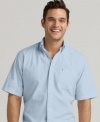 This simple button-down shirt from Tommy Hilfiger is the perfect complement to patterned shorts.