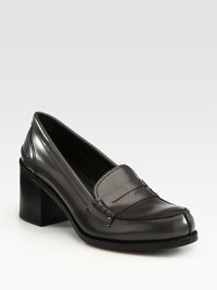 Rich Italian leather shape with fringed trim and a stacked heel. Stacked heel, 2¾ (70mm)Leather upperLeather lining and solePadded insoleMade in Italy Rich Italian leather shape with fringed trim and a stacked heel. Stacked heel, 2¾ (70mm)Leather upperLeather lining and solePadded insoleMade in Italy