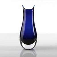 A uniquely artful piece that's mouth blown, then cut and polished by hand, bringing modern sophistication and a touch of the sublime into your home. A uniquely artful piece that's mouth blown, then cut and polished by hand, bringing modern sophistication and a touch of the sublime into your home.