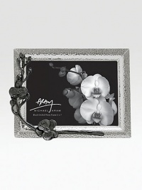 Inspired by the intricacies of natural forms, this graceful frame is richly detailed in cast metal with blackened floral accents. From the Black Orchid CollectionNickel-plate and blackened nickel-plateImportedDIMENSION INFORMATION4 X 6 (6 X 8 overall)5 X 7 (7 X 8 overall)8 X 10 (10 X 12 overall) Inspired by the intricacies of natural forms, this graceful frame is richly detailed in cast metal with blackened floral accents. From the Black Orchid CollectionNickel-plate and blackened nickel-plateImportedDIMENSION INFORMATION4 X 6 (6 X 8 overall)5 X 7 (7 X 8 overall)8 X 10 (10 X 12 overall)