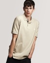 Exude effortless style with Burberry's classic polo.