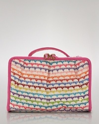 Get a bolder breed of beauty bag. From Stephanie Johnson, this generously sized cosmetics case keeps your products pretty organized.