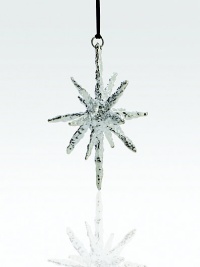 Both elegant and eclectic, this graceful silvery star has the look of shining icicles, exuding the sculptural beauty that is a Michael Aram signature.HandmadeSilverplatedAbout 6.25HImported Both elegant and eclectic, this graceful silvery star has the look of shining icicles, exuding the sculptural beauty that is a Michael Aram signature.HandmadeSilverplatedAbout 6.25HImported