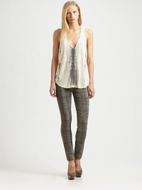 Featherweight modal tank enlivened by a fierce snake print, plunging v-neck and racerback. Plunging v-neckSleevelessRacerbackContoured back hem hits below the hipsModalDry cleanMade in USA of imported fabricModel shown is 5'10 (177cm) wearing US size Small. Featherweight modal tank enlivened by a fierce snake print, plunging v-neck and racerback. Plunging v-neckSleevelessRacerbackContoured back hem hits below the hipsModalDry cleanMade in USA of imported fabricModel shown is 5'10 (177cm) wearing US size Small.