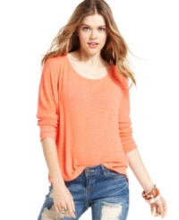 American Rag proves that hot style can be comfy too with this marled-knit, three-quarter sleeve top! Sports a revealing back cutout for a bit of attitude. American Rag proves that hot style can be comfy too with this marled-knit, three-quarter sleeve top! Sports a revealing back cutout for a bit of attitude.