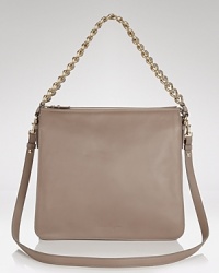 Channel this season's feminine mood with this ladylike shoulder bag from Salvatore Ferragamo. It's frame shape and rich hue makes the most sophisticated impression. Channel this season's feminine mood with this ladylike shoulder bag from Salvatore Ferragamo. It's frame shape and rich hue makes the most sophisticated impression.