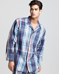 Sleep easy in this soft woven cotton pajama shirt featuring a traditional plaid pattern and the iconic pony logo on the left chest.