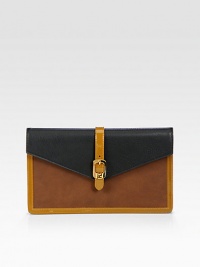 Sumptuous Italian leather in rich colors is combined with shiny patent leather accents for a tailored flap-top design. Magnetic snap flap closureOne outside zip pocketOne inner zip compartmentOne inside open pocketEight credit card slotsSuede, leather and cotton lining9¾W X 6H X 1DMade in Italy Sumptuous Italian leather in rich colors is combined with shiny patent leather accents for a tailored flap-top design. Magnetic snap flap closureOne outside zip pocketOne inner zip compartmentOne inside open pocketEight credit card slotsSuede, leather and cotton lining9¾W X 6H X 1DMade in Italy