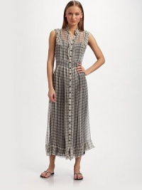 Airy silk chiffon in graphic window checks, is trimmed with ruffles for an ultra femme design.Ruffled collar Sleeveless with ruffle trim Ruffled front button placket Seamed waist Ruffled hem Contrast rayon camisole dress About 50 from shoulder to hem Silk; dry clean Made in Italy Airy silk chiffon in graphic window checks, is trimmed with ruffles for an ultra femme design.Ruffled collar Sleeveless with ruffle trim Ruffled front button placket Seamed waist Ruffled hem Contrast rayon camisole dress About 50 from shoulder to hem Silk; dry clean Made in Italy