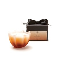 This elegantly scalloped D.L. & Co. candle contains an evocative fragrance blend of rockrose, benzoin and vanilla. Comes in an exquisite black ribboned box for the perfect gift.