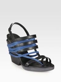 Enhanced by an adjustable slingback, this smooth leather style has colorblocked straps and a unique toe ring. Stacked wedge, 4 (100mm)Stacked platform, ½ (15mm)Compares to a 3½ heel (90mm)Leather upperLeather lining and solePadded insoleMade in ItalyOUR FIT MODEL RECOMMENDS ordering one half size up as this style runs small. Enhanced by an adjustable slingback, this smooth leather style has colorblocked straps and a unique toe ring. Stacked wedge, 4 (100mm)Stacked platform, ½ (15mm)Compares to a 3½ heel (90mm)Leather upperLeather lining and solePadded insoleMade in ItalyOUR FIT MODEL RECOMMENDS ordering one half size up as this style runs small.
