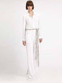 Look simply chic in this floor-sweeping minimalist jumpsuit, with a braided belt for a casual-cool effect. Shirt collarDropped shouldersLong sleeves with button cuffsButton-down front with hidden placketShirred bodiceBanded waist with belt loops and removable braided beltFront slash pocketsInseam, about 39Rise, about 11ViscoseDry cleanImportedModel shown is 5'10.5 (179cm) wearing US size 4. Look simply chic in this floor-sweeping minimalist jumpsuit, with a braided belt for a casual-cool effect. Shirt collarDropped shouldersLong sleeves with button cuffsButton-down front with hidden placketShirred bodiceBanded waist with belt loops and removable braided beltFront slash pocketsInseam, about 39Rise, about 11ViscoseDry cleanImportedModel shown is 5'10.5 (179cm) wearing US size 4.