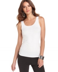 A wardrobe staple, this Kensie solid tank is perfect for everyday style! A wardrobe staple, this Kensie solid tank is perfect for everyday style!