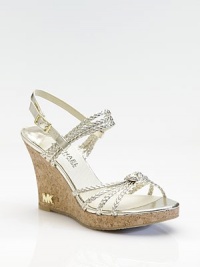 Shimmery braided leather with a hint of metallic and goldtone MK logo at the heel.Cork wedge heel, 3¾ (95mm) Cork platform, ¾ (20mm) Compares to a 3 heel (75mm) Open toe Adjustable ankle strap Leather lining Padded insole Rubber sole Imported Shimmery braided leather with a hint of metallic and goldtone MK logo at the heel.Cork wedge heel, 3¾ (95mm) Cork platform, ¾ (20mm) Compares to a 3 heel (75mm) Open toe Adjustable ankle strap Leather lining Padded insole Rubber sole Imported